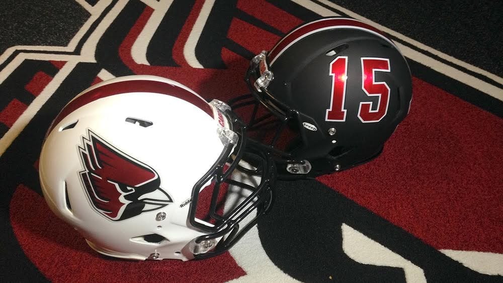 <p>Ball State will feature six total helmet designs this season. New white and black chrome helmets have been added, along with helmets showing support for the military and breast cancer awareness. <em>PHOTO PROVIDED BY BALL STATE ATHLETICS</em></p>