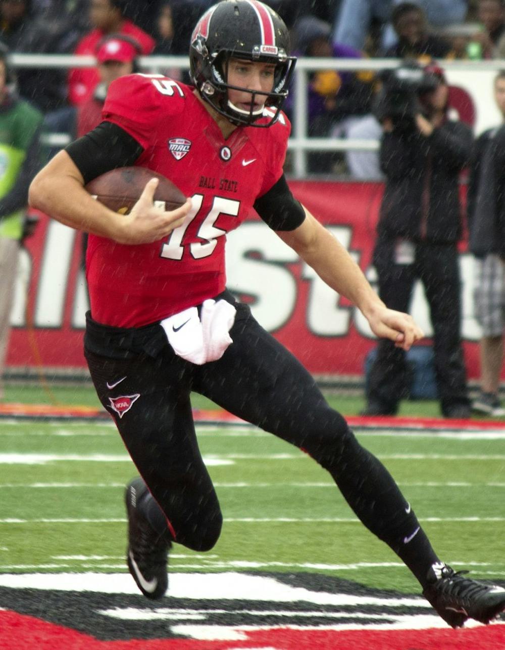 Riley Neal, Ball State’s freshman quarterback, runs the ball in a game against Central Michigan University on Oct. 24 at Scheumann Stadium.