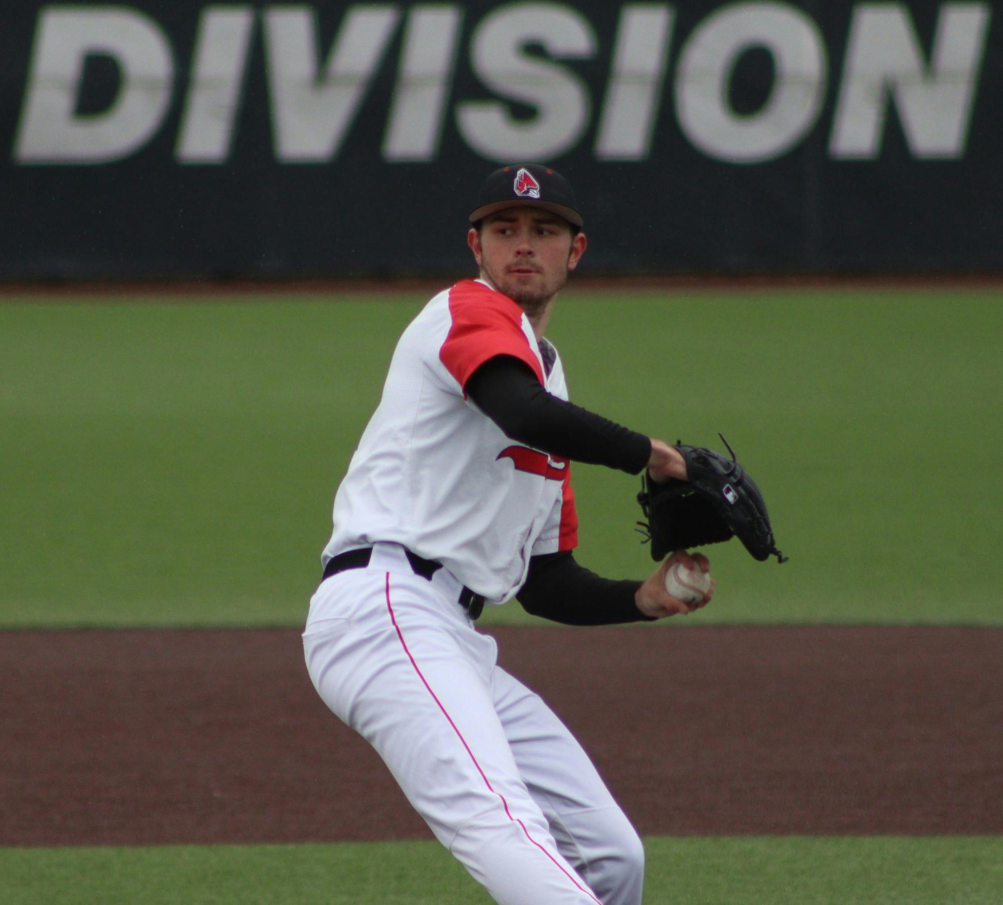 Junior pitcher Tyler Schweitzer throws a pitch at the game against Bowling Green at the First Merchant Baseball Complex on March 19. Schweitzer had nine strike outs in the game. Jamie Howell, DN 