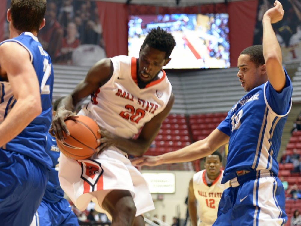 Senior Chris Bond gets the ball during the game against Buffalo Jan. 23 in Worthen Arena. DN PHOTO SICONG XING