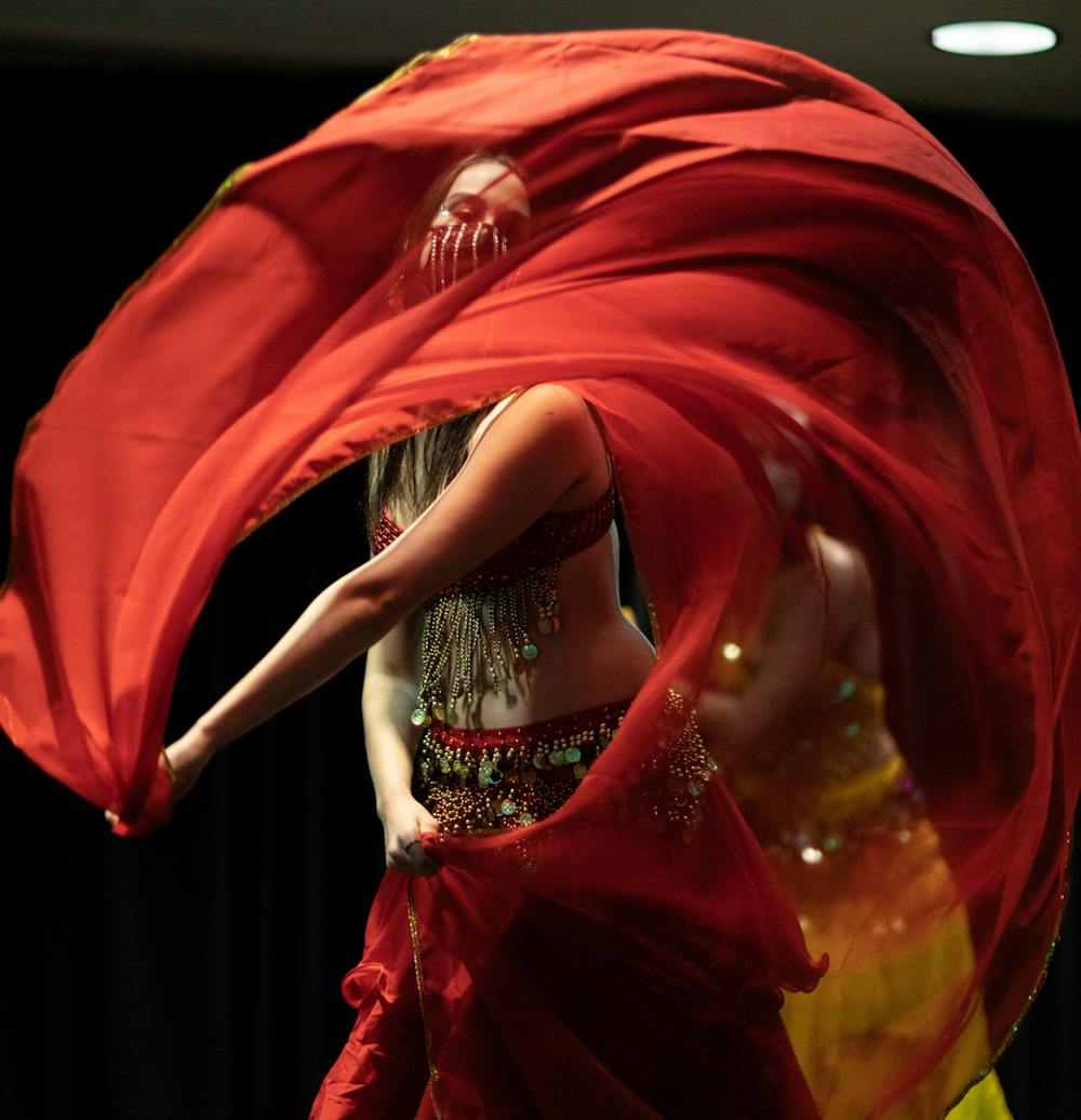 <p>Belly dancers from the Belly Dance Club perform during the Latinxpalooza event Jan. 21 at the L.A. Pittenger Student Center. The Belly Dance Club had 5 dancers and performed twice at the Latinxpalooza event. <strong>Eli Houser, DN</strong></p>
