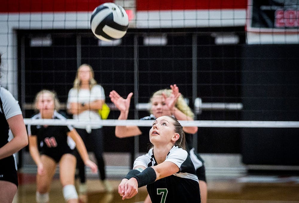 Former Yorktown volleyball player Kate Vinson passes the ball in a game. Yorktown head coach Stephanie Bloom played at Ball State from 2001-04. Yorktown High School Athletics, Photo Provided 