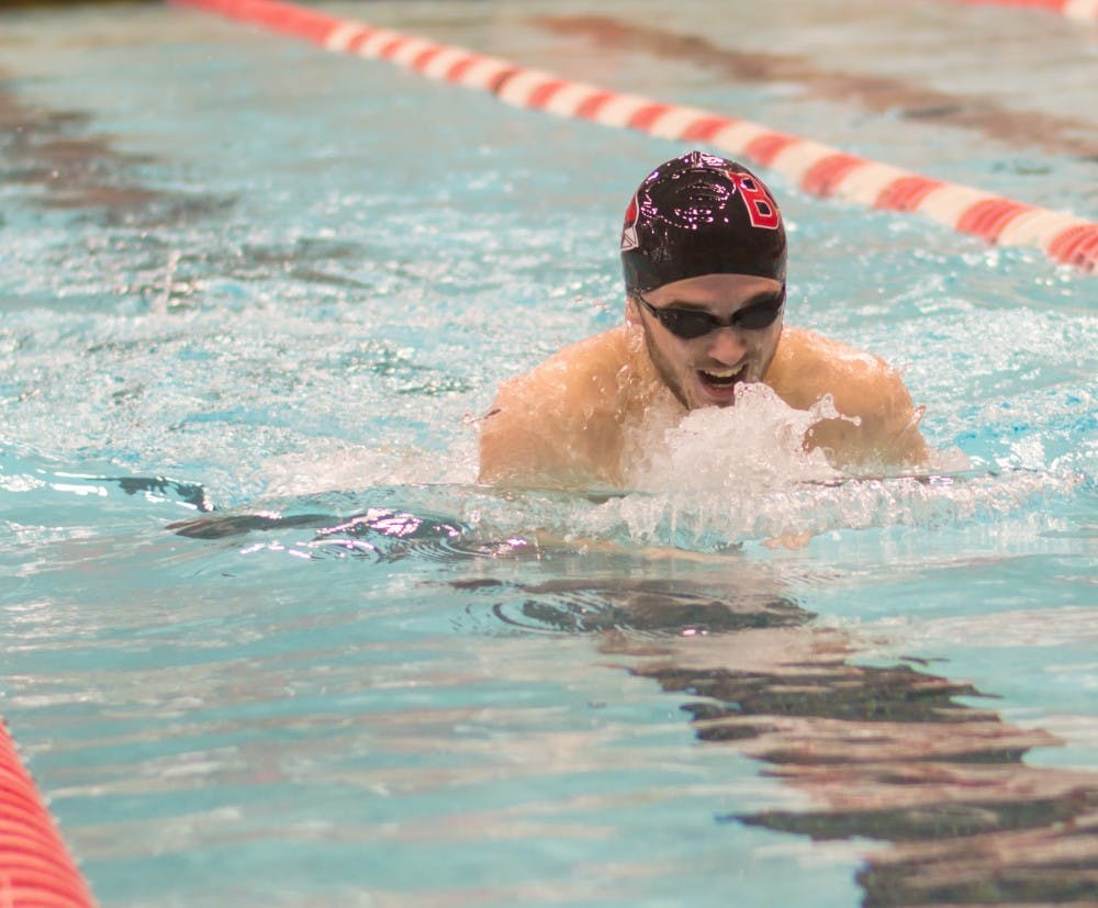 <p>Sophomore Spencer Ball swims the 200-yard IM during the meet against Eastern Michigan on Jan. 13 in Lewellen Pool. Ball finished first with a time of 2:02.41. Teri Lightning Jr., DN</p>