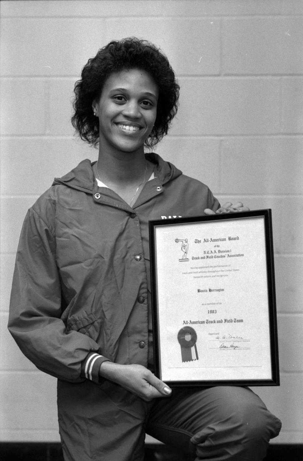 <p>Bonita Harrington poses with her 1984 NCAA Track All-American award Feb. 2, 1984. Harrington was inducted to the Ball State Hall of Fame in 1996. Ball State Repository, Photo Provided&nbsp;</p>