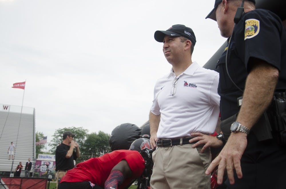 Head coach Pete Lembo prepares to take the field in for the home opener against Colgate on Aug. 20 at Scheumann Stadium. DN PHOTO BREANNA DAUGHERTY