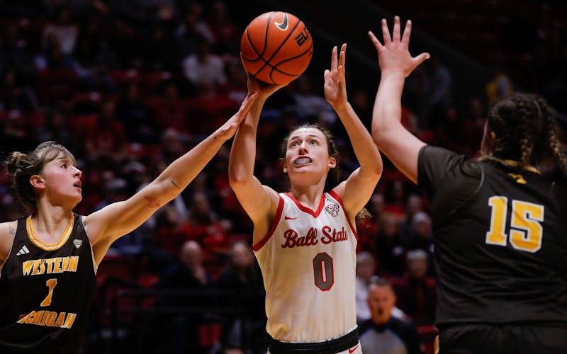 Ball State senior Ally Becki puts the ball up for a lay-up against Western Michigan Feb. 1 at Worthen Arena. Becki had 17 points for the Cardinals. Andrew Berger, DN 