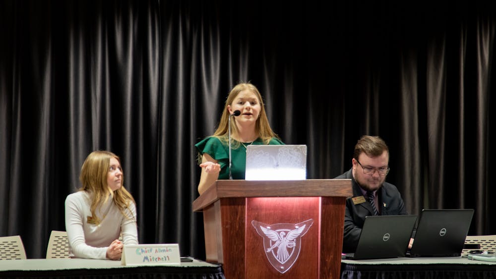 Student Government Association Parliamentarian Brenna Large presents for the president pro-tempore position in the L.A. Pittenger Student Center ballroom on March 29. Large was elected for the position. Madelyn Bracken, DN