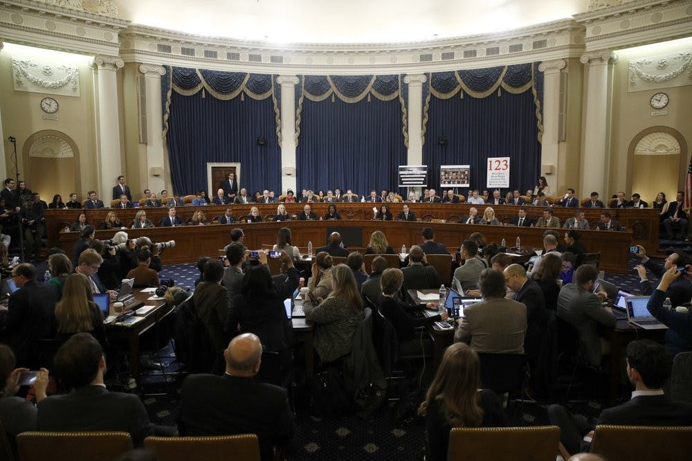 <p>Member of the committee work during a House Judiciary Committee markup of the articles of impeachment against President Donald Trump, Friday, Dec. 13, 2019, on Capitol Hill in Washington. Trump impeachment goes to full House after Judiciary panel approves charges of abuse of power, obstruction of Congress.<strong> (AP Photo/Patrick Semansky, Pool)</strong></p>