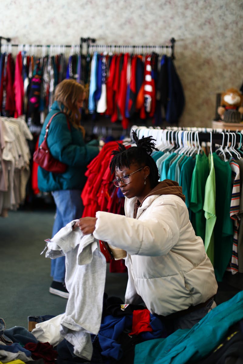 Third-year psychology major Andria Johnson shops at Well Made Vintage, a newly opened thrift store in the Village, March 21. Jacy Bradley, DN