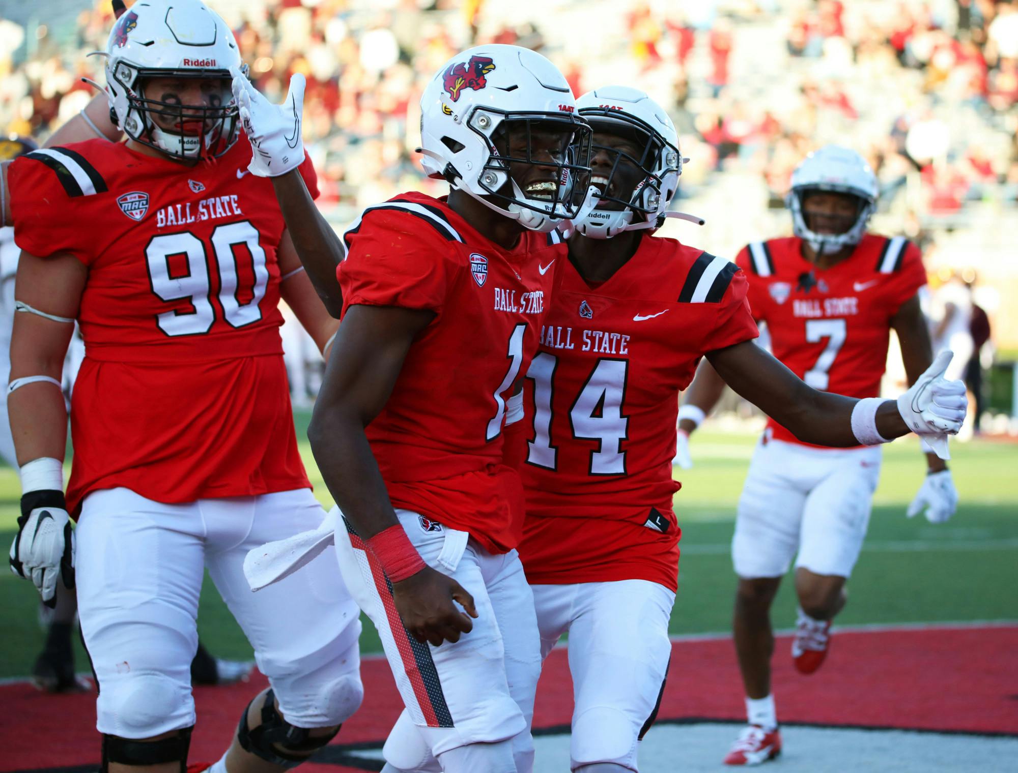 Ball State football celebrates scoring a tocuhdown against Central Michigan Oct. 21 at Scheumann Statdium. The Cardinals won 24-17 against the Chippewas. Mya Cataline, DN