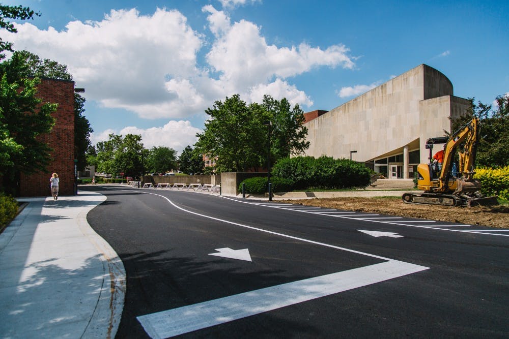<p>The road behind the parking garage and Pruis Hall has been complete. It was one of the temporary sidewalk closings occurring on campus. Reagan Allen // DN</p>
