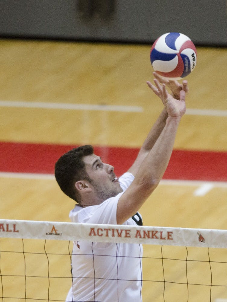 Sophomore setter Hiago Garchet sets the ball in the match against Mount Olive on March 1 at Worthen Arena. DN PHOTO BREANNA DAUGHERTY 