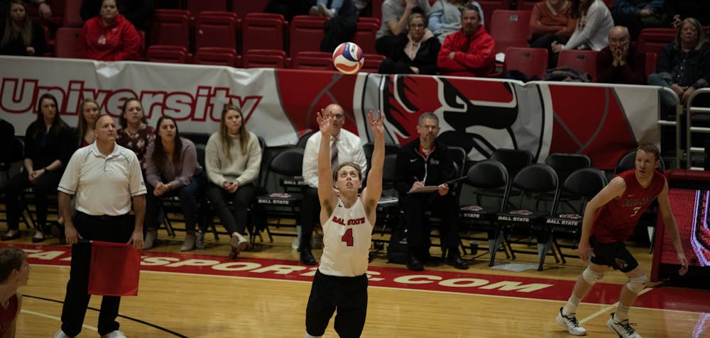Senior libero Nick LaVanchy setting the ball for his team Feb. 15, 2020, at John E. Worthen Arena. The Cardinals lost 1-3 to the Flyers. Joshua Smith, DN