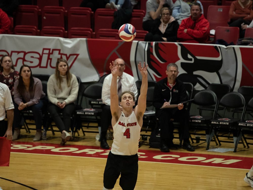 Senior libero Nick LaVanchy setting the ball for his team Feb. 15, 2020, at John E. Worthen Arena. The Cardinals lost 1-3 to the Flyers. Joshua Smith, DN