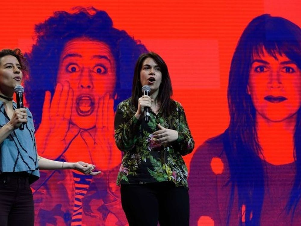 Ilana Glazer, left, and Abbi Jacobson of the Comedy Central show "Broad City"at the news conference announcing Spotify’s new services. The channel, and others, will provide short video clips. Photo by Don Emmert/Agence France-Presse — Getty Images