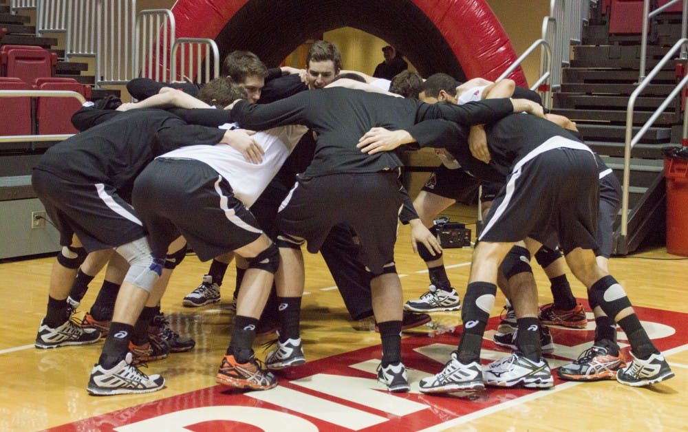 Members of the men's volleyball team huddle before the game against Quincy on Jan. 30 at Worthen Arena. DN PHOTO ALAINA JAYE HALSEY