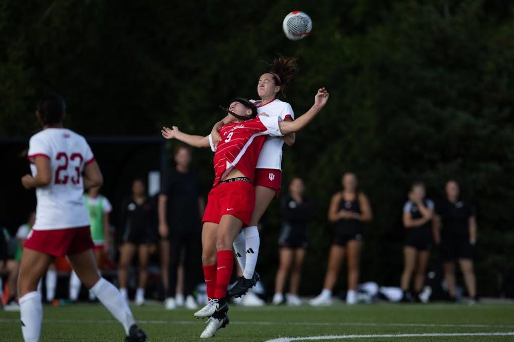 Junior forward Emily Roper collides with a defender against Indiana University Bloomington Aug 20 at Briner Sports Complex. Roper has played 67 minutes this year. Titus Slaughter, DN