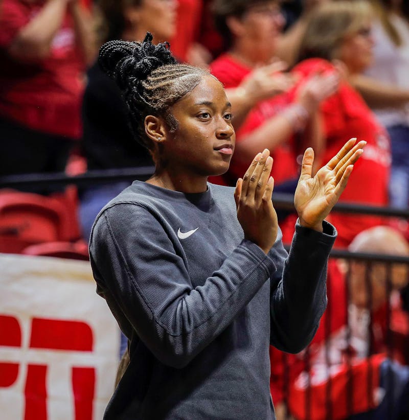 Redshirt sophomore outside hitter Aniya Kennedy cheers on her team from the sideline as they face Wright State Sept. 21 at Worthen Arena. Due to a minor knee injury Kennedy missed two matches against Butler and Wright State. Andrew Berger, DN 
