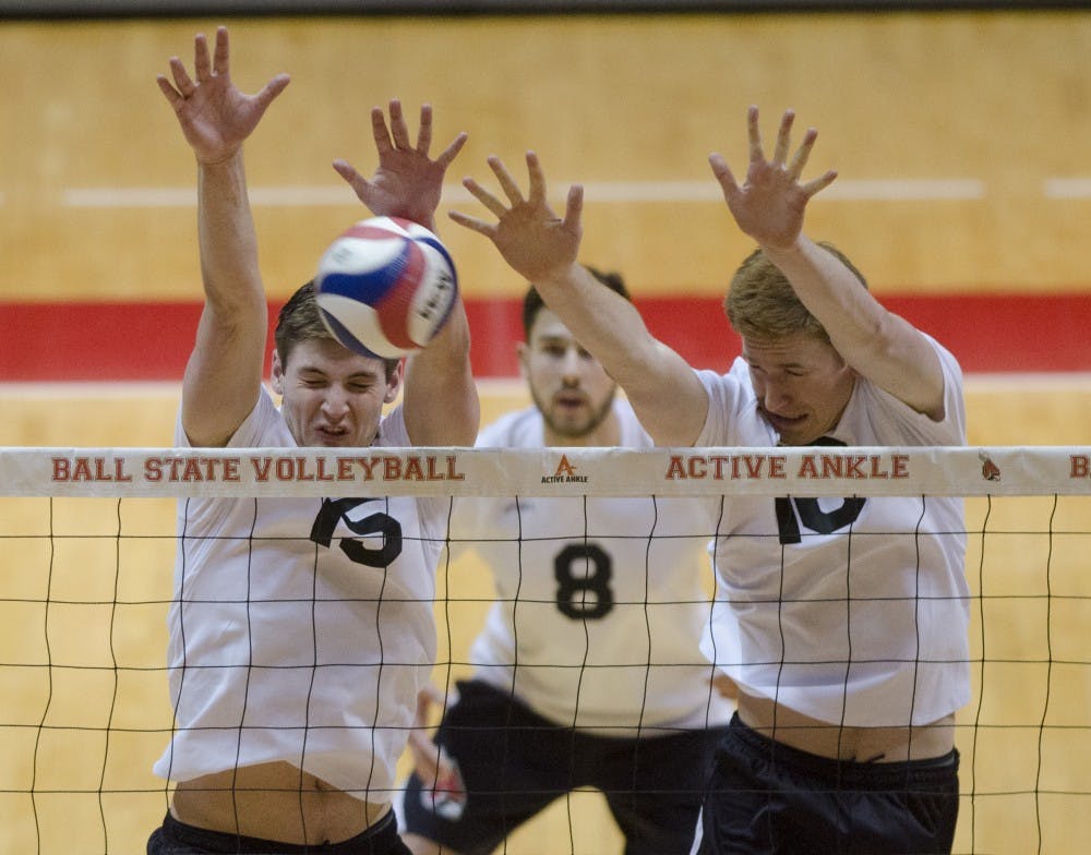 Sophomore outside attacker Marcin Niemczewski and senior middle attacker Kevin Owens go up for a block in the second set against McKendree on Jan. 24 at Worthen Arena. Owens has had 16 total blocks in this season, second on the team. DN FILE PHOTO BREANNA DAUGHERTY