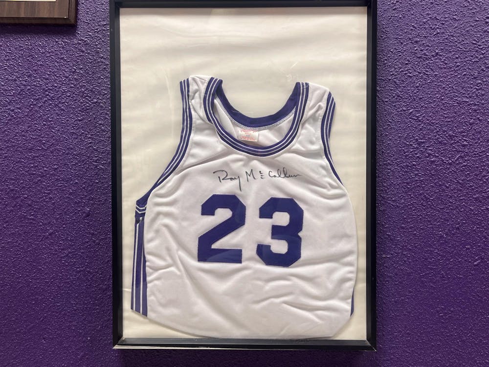 A jersey formerly worn by Muncie Central boys' basketball alumni Ray McCallum is framed in the memorabilia room at the Muncie Fieldhouse March 25. McCallum was a starter for Muncie Central's 1978 and 1979 state championship teams. Kyle Smedley, DN