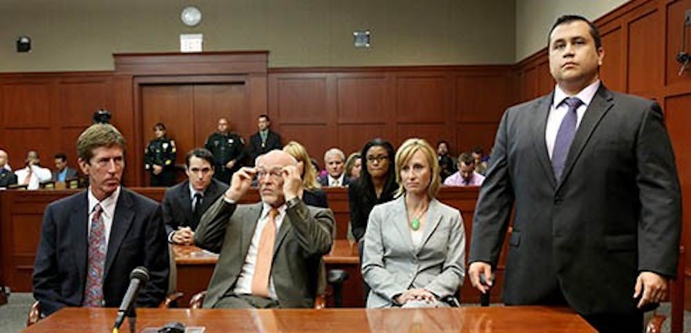 George Zimmerman stands when the jury arrives to deliver the verdict on the 25th day of his trial at the Sanford, Fla. Zimmerman was found not gulity of second-degree murder in the fatal shooting of Trayvon Martin, an unarmed teen. MCT PHOTO