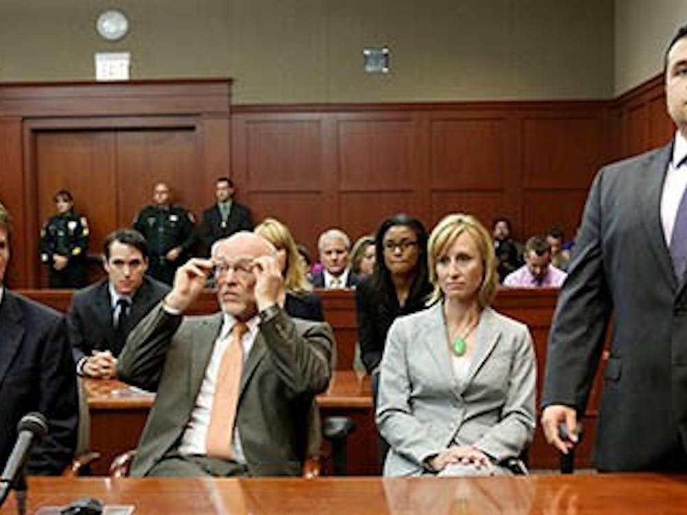 George Zimmerman stands when the jury arrives to deliver the verdict on the 25th day of his trial at the Sanford, Fla. Zimmerman was found not gulity of second-degree murder in the fatal shooting of Trayvon Martin, an unarmed teen. MCT PHOTO
