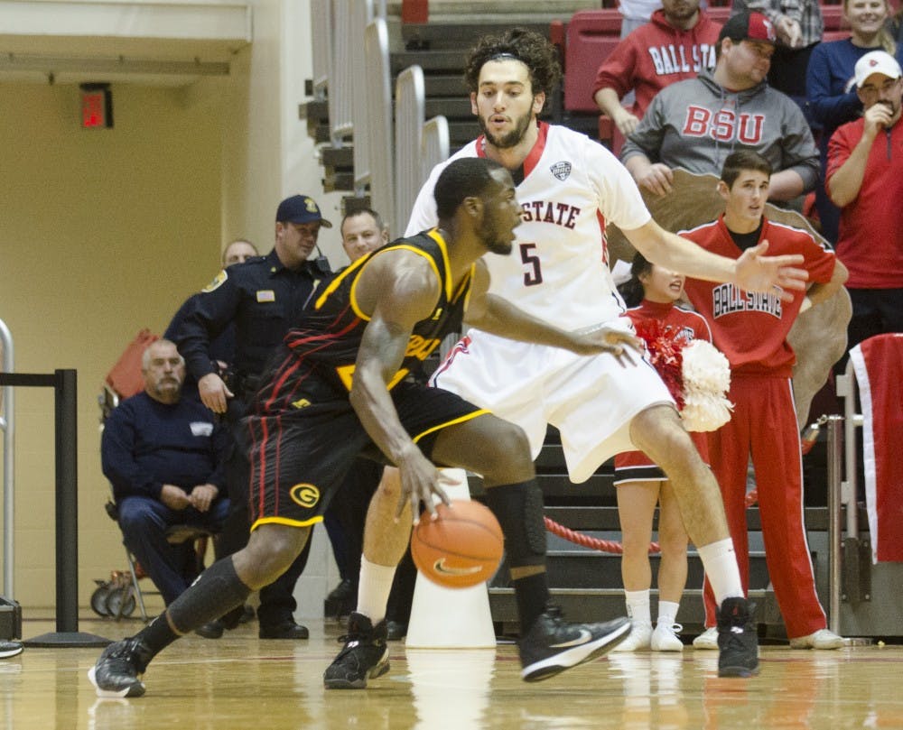 Redshirt sophomore junior Rocco Belcaster attempts to block a Grambling player during the game on Nov. 24 at Worthen Arena. DN PHOTO BREANNA DAUGHERTY