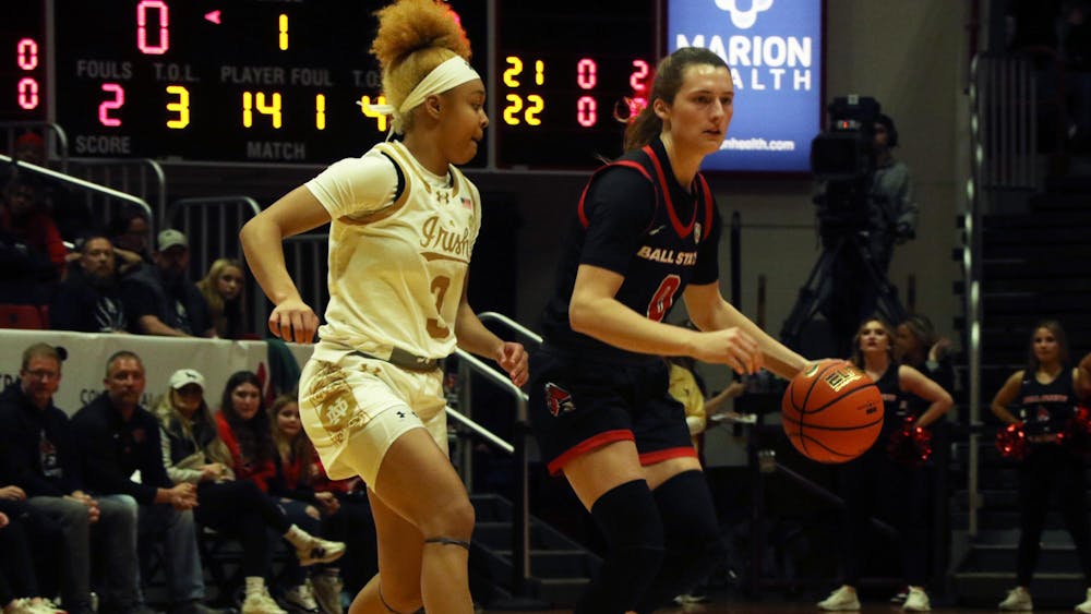 Junior Ally Becki dribbles Nov. 24 in a game against Notre Dame at Worthern Arena. Zach Carter, DN.