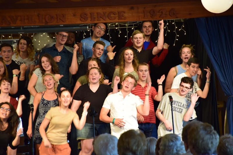 Casey Picillo, middle, performs in one of Fair Hills Tuesday night hootenanny's. The song and dance routine is put on by the entire staff of the Minnesota resort and is claimed to be one of the favorite activities by staff and guests alike. Casey Picillo // Photo Provided