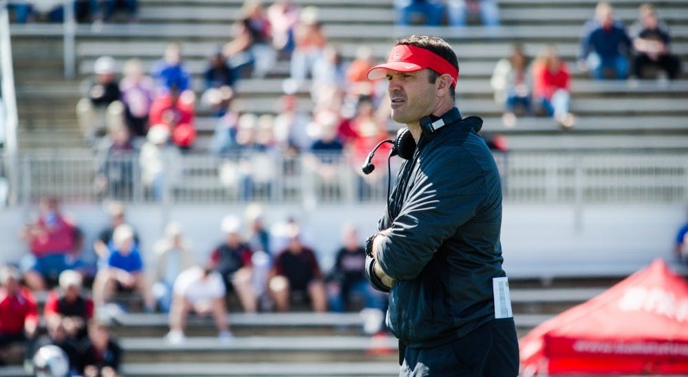 Ball State head coach Mike Neu looks on as the Cardinals play in their annual Spring Football Game. Neu is in his first season as Ball State's head coach. DN File // Kellen Hazelip