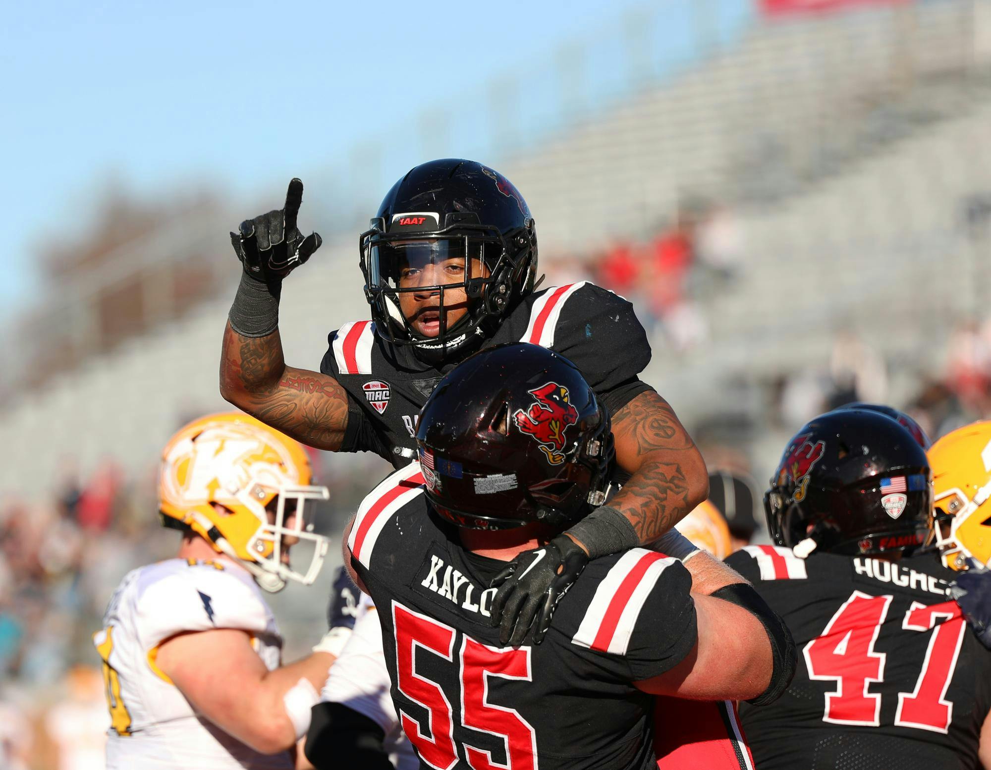 Redshirt junior running back Marquez Cooper celebrates scoring a touch down against Kent State Nov. 18 at Scheumann Stadium. Cooper had a total of 142 rushing yards in the game. Mya Cataline, DN