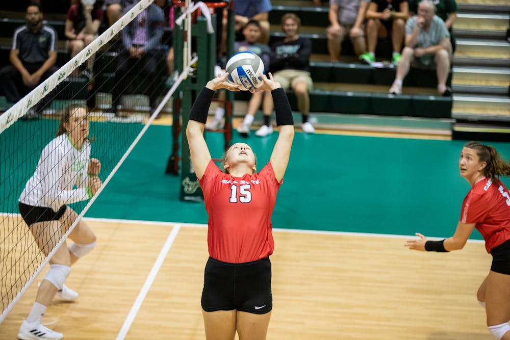 Sophomore setter Megan Wielonski sets the ball in a match against South Florida Aug. 26 in Tampa, Fla. Wielonski had 47 assists during the match. Mary Holt, South Florida Athletics, Photo Provided