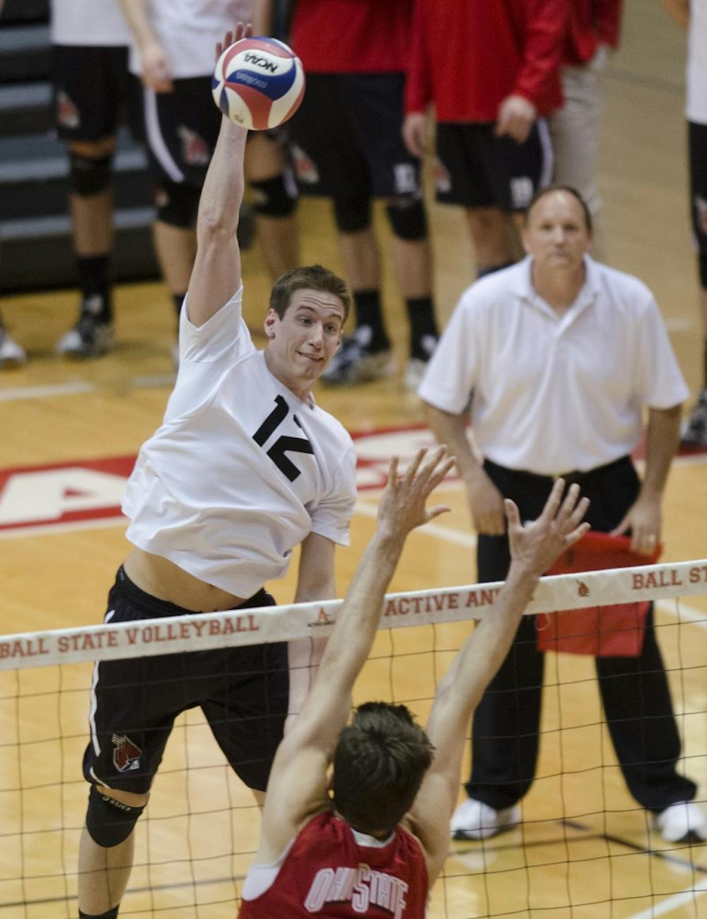 Junior outside attacker Matt Sutherland hits the ball over the net against Ohio State in the second set March 23 at Worthen Arena. Sutherland had 14 kills. DN PHOTO BREANNA DAUGHERTY