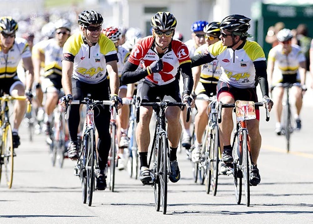 Lance Armstrong, centre, leads members of his Tour de Lance team on an inaugural lap of the Circuit de Mont Tremblant in Mont Tremblant, Quebec, north of Montreal, Canada, Saturday, September, 11, 2010, during a fundraiser in aid of the Cedars cancer institute of the McGill University health centre. (Graham Hughes/Postmedia News/MCT)