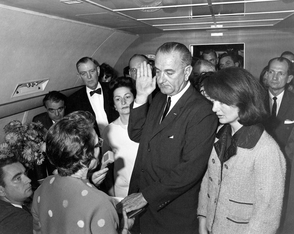 Judge Sarah T. Hughes administers the Presidential Oath of Office to Lyndon Baines Johnson at 2:39 p.m. on Nov. 22, 1963, aboard Air Force One, at Love Field, Dallas. Live CBS news coverage from President John F. Kennedy