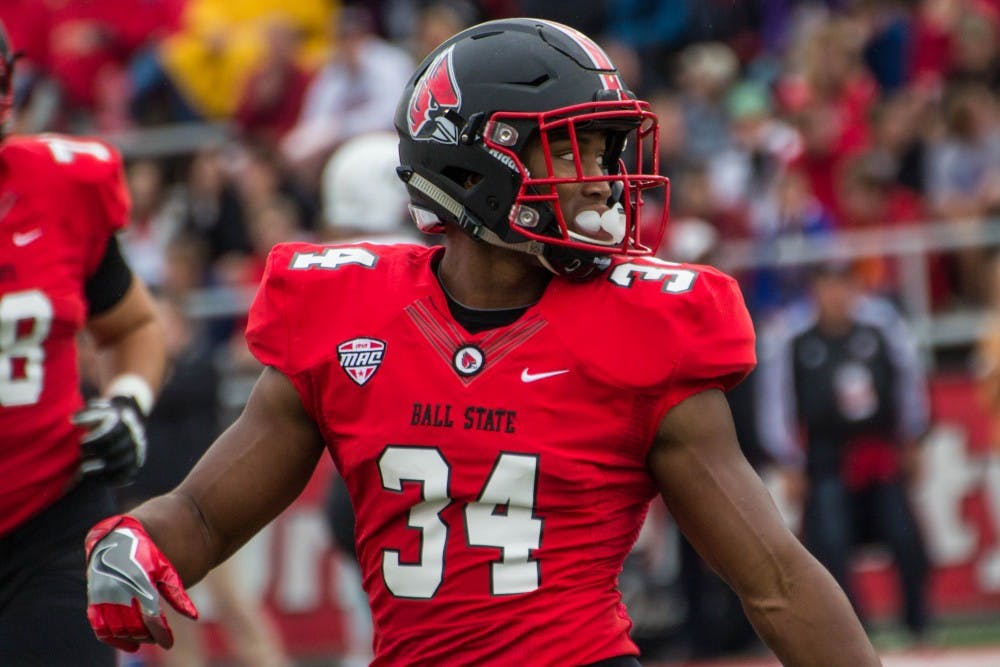 <p>Cardinals running back James Gilbert got the final three carries of the Ball State drive, capping it off with a 3-yard touchdown run. Ball State football opens the 2017 season against Illinois Saturday at noon. Grace Ramey, DN</p>