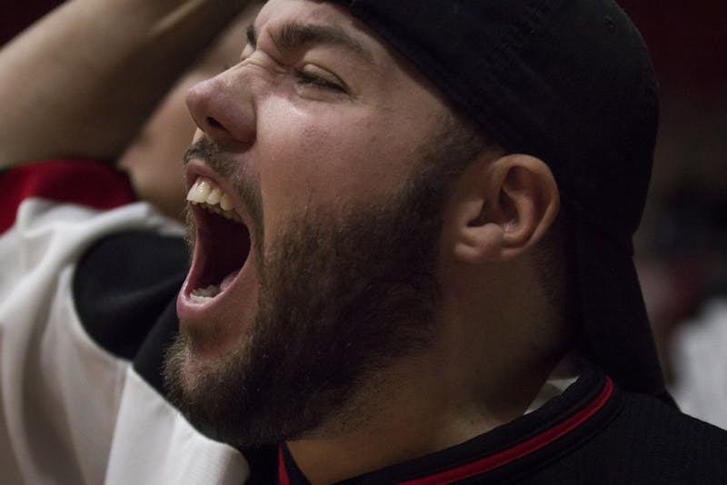 A Ball State Pep Band member yells after a dunk made by a Ball State forward against Oakland City Mighty Oaks Nov. 28 at John E. Worthen Arena. Ball State defeated Oakland, 57-81. Grace Hollars, DN
 