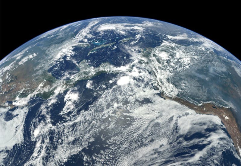 This image of Earth was captured by the MESSENGER spacecraft during a flyby of our home planet on Aug. 2, 2005. The global warming trend is proceeding at a rate that is unprecedented over decades to millennia. NASA, Photo Courtesy