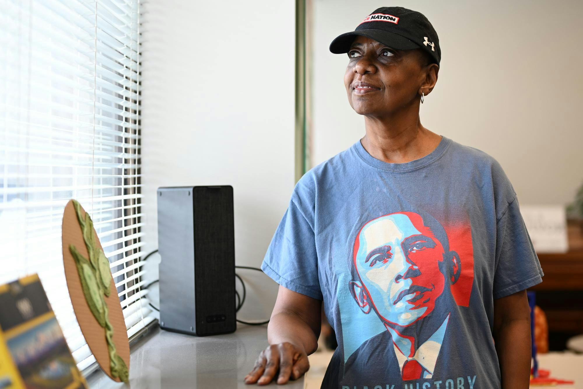 Reneé Jackson-Lester poses for a portrait during the Little Red Door Cancer Agency’s open house event Feb. 19 in Indianapolis Indiana. Lester is a client of Little Red Door and received a free wig from the nonprofit’s “Michele’s boutique” service. Ryan Fleek, DN