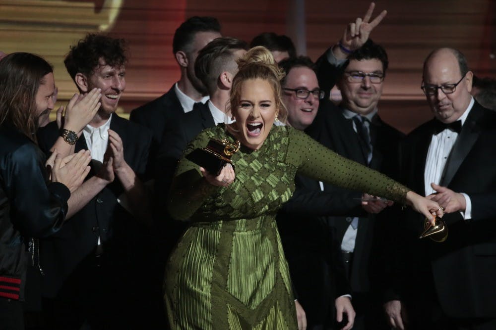 Adele on stage after winning Album of the Year for ''25'' during the 59th Annual Grammy Awards at Staples Center in Los Angeles on Sunday, Feb. 12, 2017. (Robert Gauthier/Los Angeles Times/TNS)