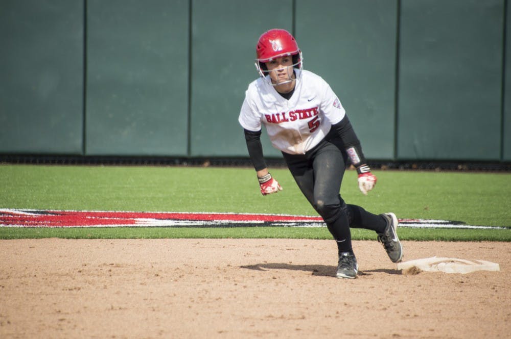 Senior outfielder Loren Cihlar begins to run to third base during the second game of the double header against Western Kentucky at First Merchants Ballpark Complex on March 21. DN PHOTO ALAINA JAYE HALSEY