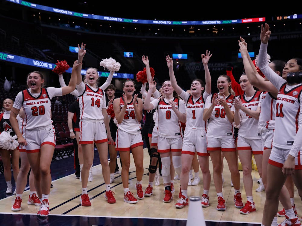 The Ball State women&#x27;s basketball team celebrates a win in a game against Akron in the MAC Tournament Quarterfinals March 8 at Rocket Mortgage Fieldhouse in Cleveland. Amber Pietz, DN