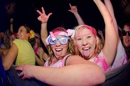 Two students take in the Life in Color concert. The event took place Nov. 10 in Worthen Arena. DN FILE PHOTO COREY OHLENKAMP