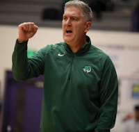 Yorktown head coach Matt Moulton celebrates Dec. 14 during the Fieldhouse Classic at the Muncie Central Fieldhouse. Zach Carter, DN. 