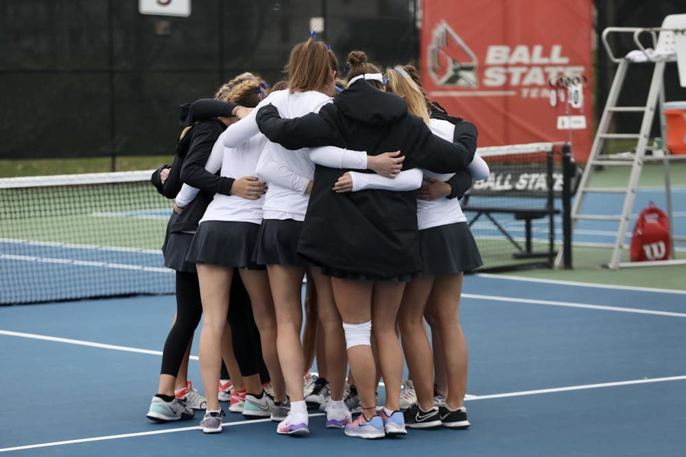 The Ball State Women's Tennis team huddles before a match March 26, 2021, in the Cardinal Creek Tennis Center. The Cardinals won 4-3 against the Falcons. Rylan Capper, DN 