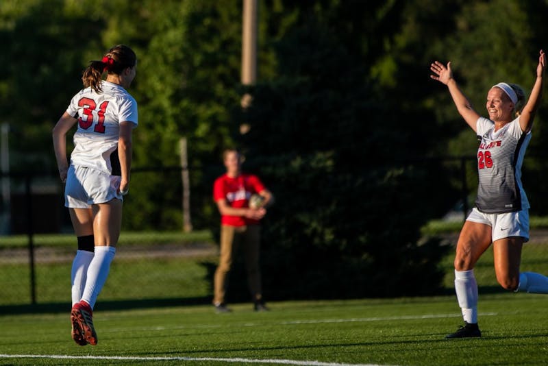 Tatiana Mason and Jenna Dombrowski celebrate after Mason scores a goal, putting the Cardinals in the lead against the University of Nebraska-Omaha Friday, Sept. 14, 2018, at Briner Sports Complex. Ball State went on to defeat Omaha 3-1 with all goals being scored in the second half of the game. Eric Pritchett, DN File