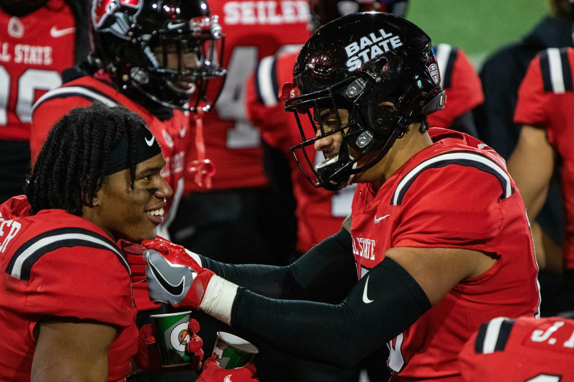 Ball State junior wide receiver Yo&#x27;Heinz Tyler talks with a teammate after scoring a touchdown Nov. 18, 2020, at Scheumann Stadium. Ball State won 31-25 against the Huskies. Jaden Whiteman, DN