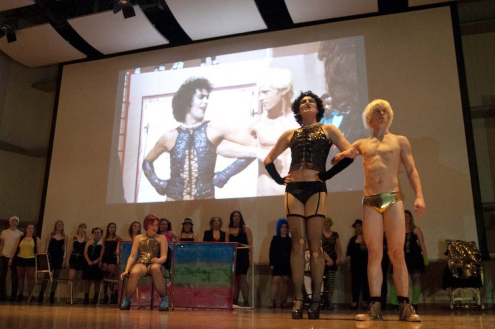 Students enact the Rocky Horror Picture Show last year at an annual event in Pruis Hall. Students bring out wacky traditions and customs that are a large part of the experience. DN FILE PHOTO DYLAN BUELL