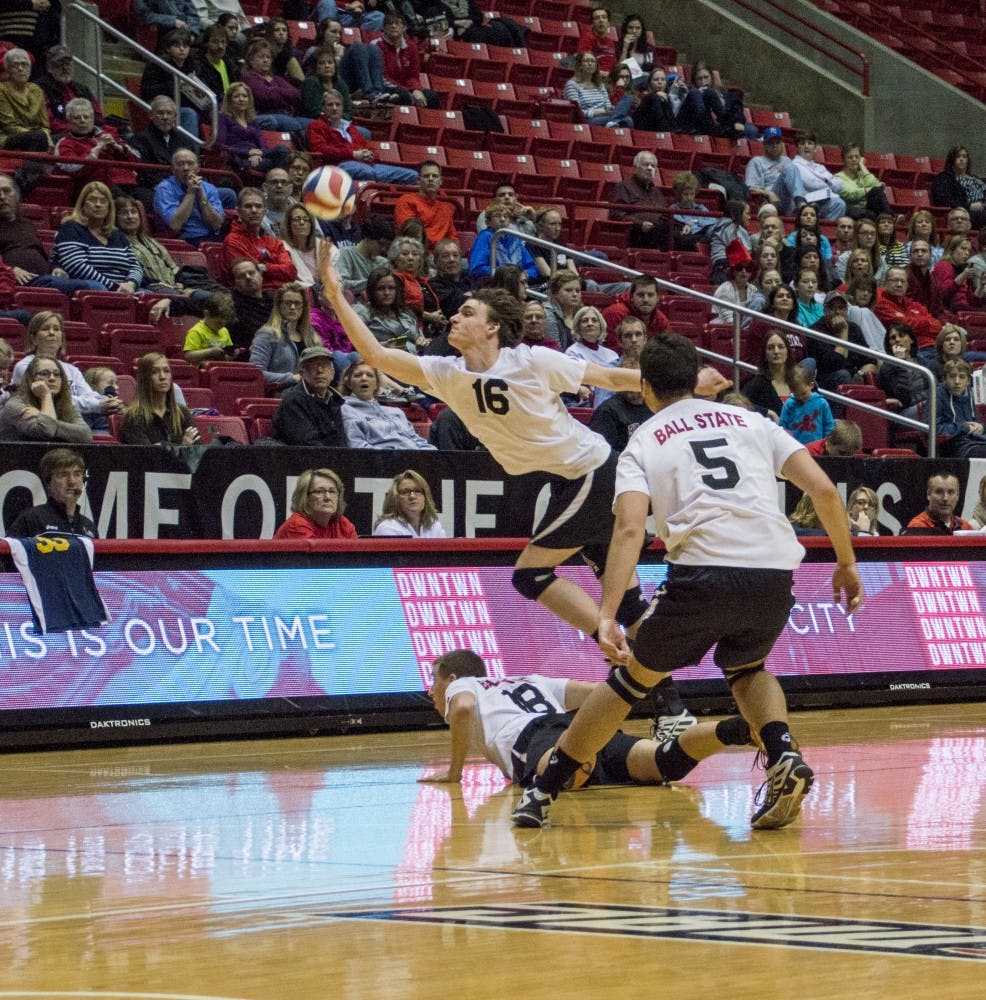 Freshman middle attacker Matt Walsh runs to save the ball during the game against George Mason on Feb. 7 at Worthen Arena. DN PHOTO ALAINA JAYE HALSEY