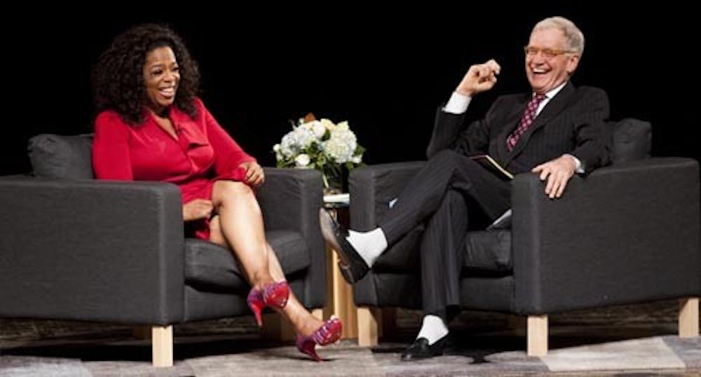 David Letterman and Oprah Winfrey laugh during the Dave+Oprah talk on Nov. 26, 2012. Winfrey also interviewed Letterman while they were on campus. That interview aired on national television for the first time Sunday. DN FILE PHOTO BOBBY ELLIS